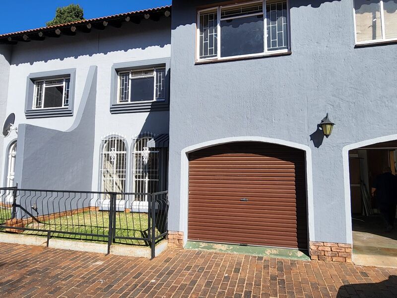 Duplex frontage with its own garage